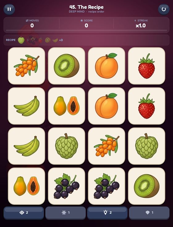 A board with a recipe strip along the top demanding a specific fruit.